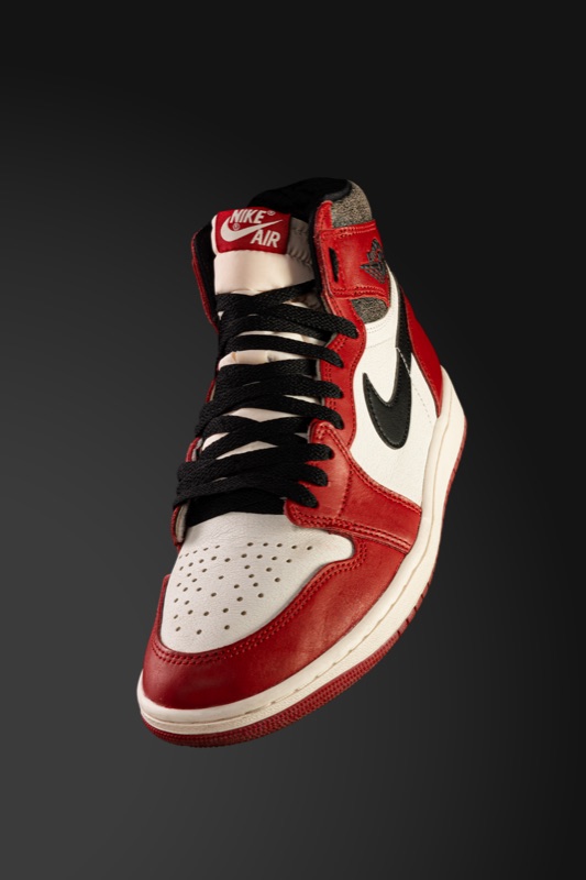 A red, white and black high-top sneaker