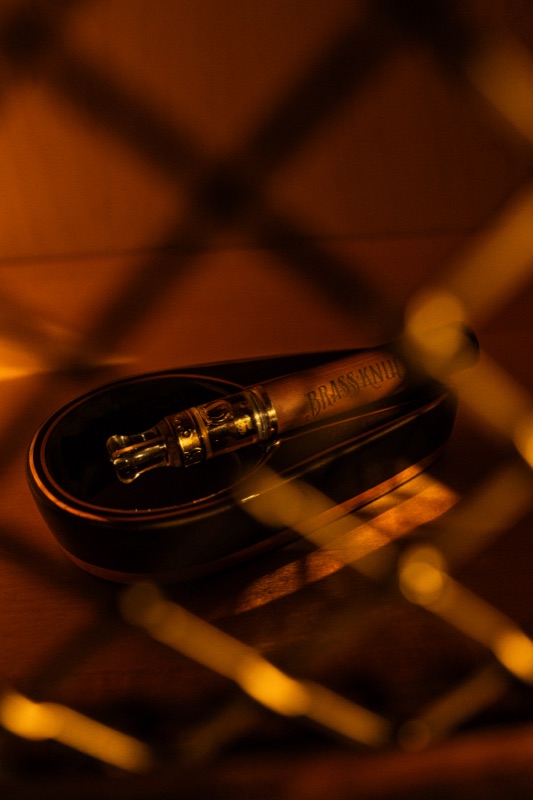 A cigar in a dark lounge